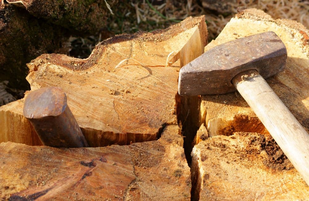 splitting wood with wedge